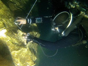 Cave diver laying line tie off