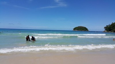 The dive team practice a shore entry at Kata Beach